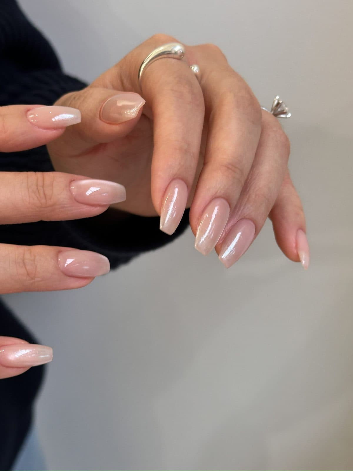 Long coffin gel extensions in a glossy milky pink at Joy Nail Studio Vancouver